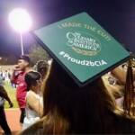 Photo image of Caitlin's high school graduation cap topper