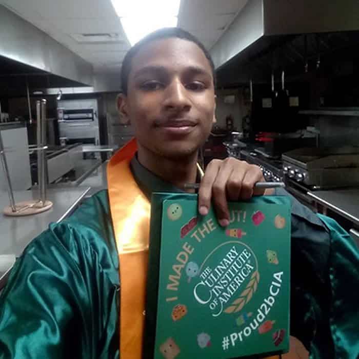 Photo image of Jahqyad's high school graduation cap topper