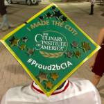 Photo image of Marco's high school graduation cap topper