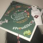Photo image of Naya's high school graduation cap topper