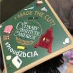 Photo image of Rayna's high school graduation cap topper