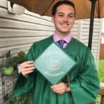 Photo image of Sean's high school graduation cap topper