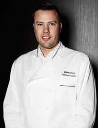 Photo of Matthew Farrell, Customer Dedicated Executive Chef for American Airlines and CIA culinary arts graduate