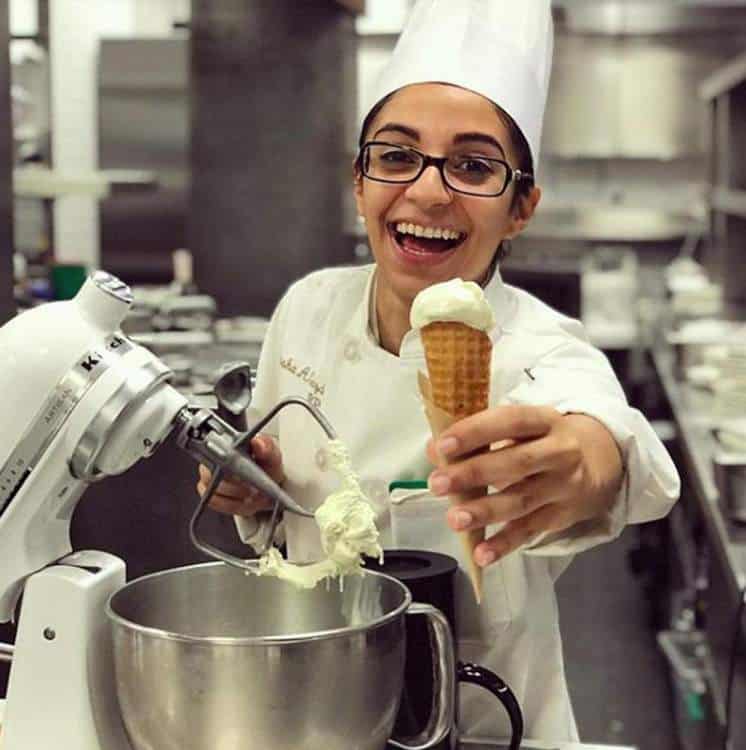 Culinary student serving liquid nitrogen ice cream at The Culinary Institute of America.