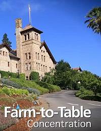 An old stone building with a tall tower stands amidst lush greenery under a clear blue sky. The text "Farm-to-Table Concentration" is prominently displayed at the bottom of the image. A palm tree is visible on the right side.