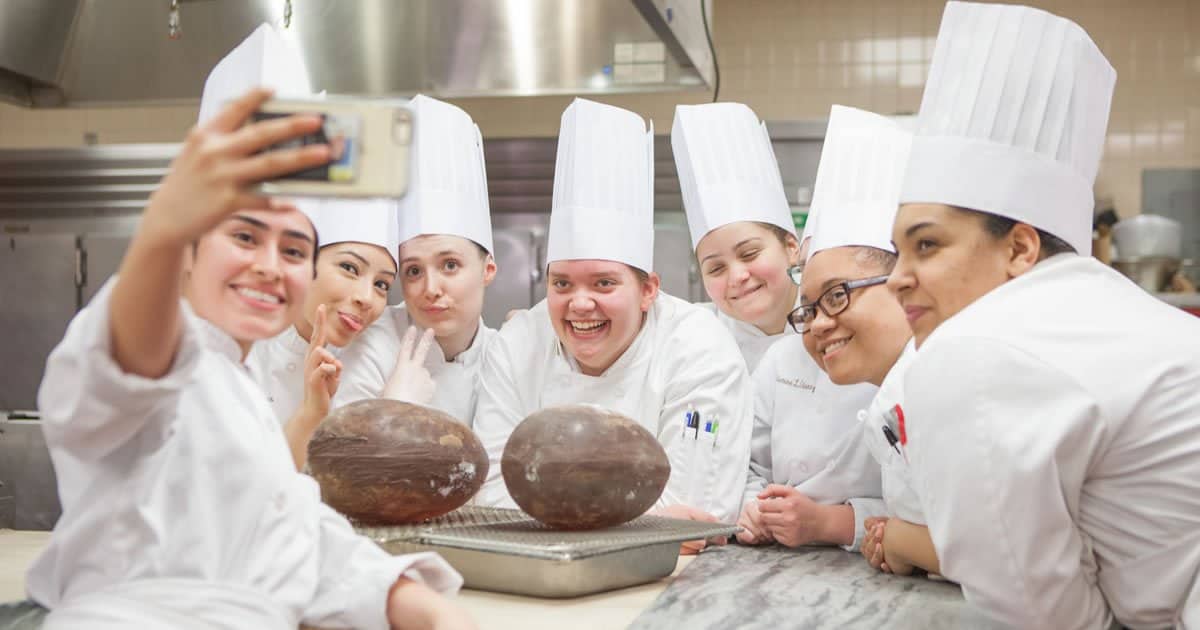 Photo of CIA baking and pastry students with candy geodes