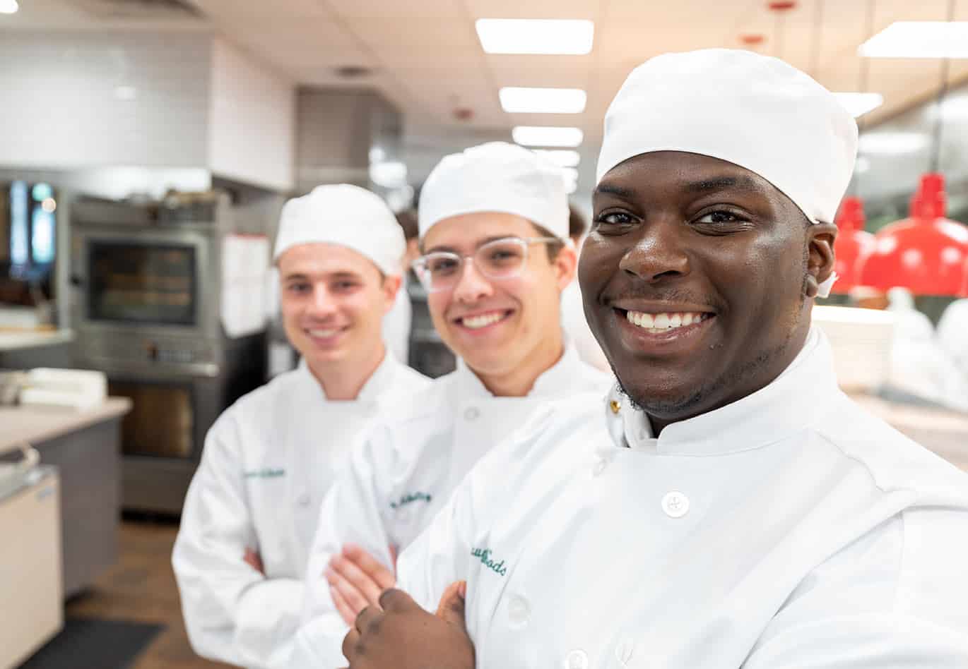 Student Life - Food Is Your Community - Three Students in Kitchen