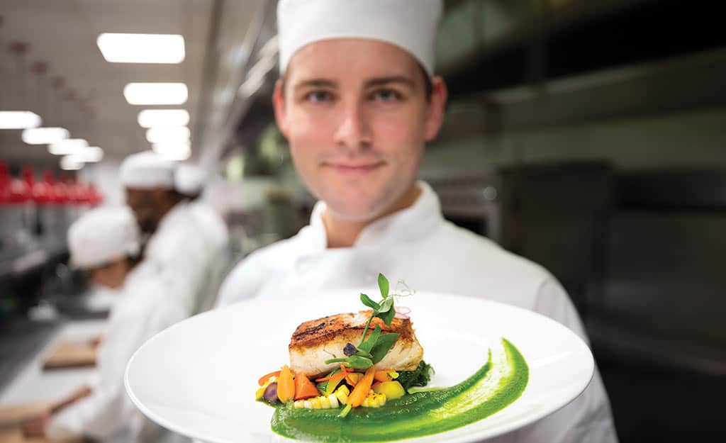 Built-In Paid Internship - Student with Plated Dish