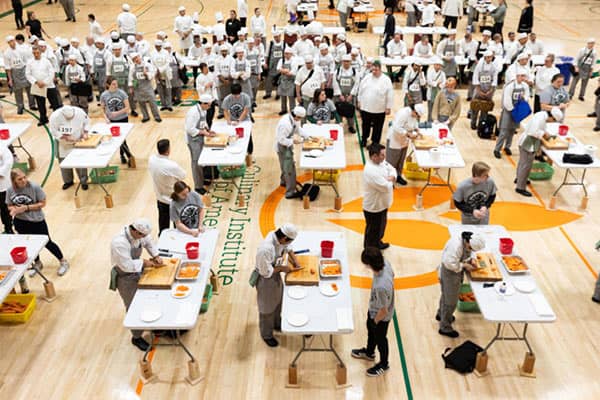 Third Annual Tri-Wizards Cup Round 1 student skills competition. Sponsors include EcoLab, Starbucks, Zwilling, and PepsiCo