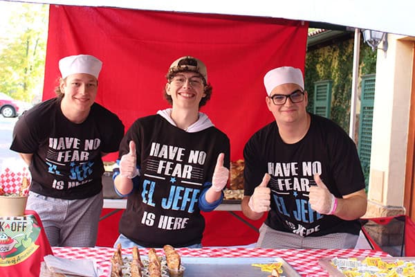 Three CIA students compete in the annual Chili Cook-Off.
