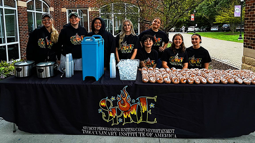 CIA students from SPICE (Student Programming Igniting Campus Entertainment) Club at a student event.