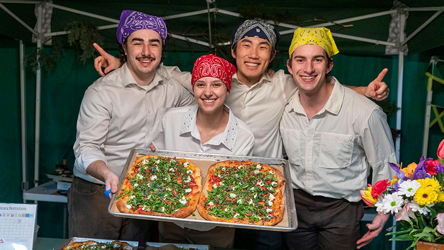 Image of CIA students competing in the 2025 Pizza Cook-Off at the Hyde Park, NY campus.