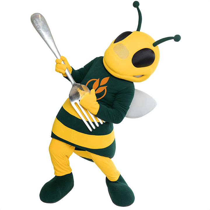 Image of CIA’s mascot Sting, holding a fork acting like he’s playing a guitar.