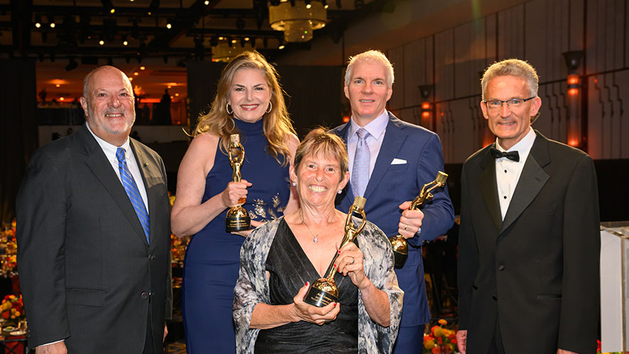 Image of CIA Chairman of the Board Marc Sarrazin, Elizabeth Blau, Brandon Chrostowski ’06, Ann Cooper ’79, and CIA President Michiel Bakker at the CIA Leadership Awards.