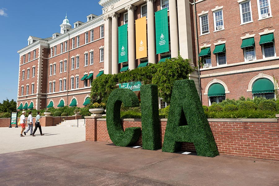 Image of giant CIA letters in front of Roth Hall at the Culinary Institute of America’s New York campus.