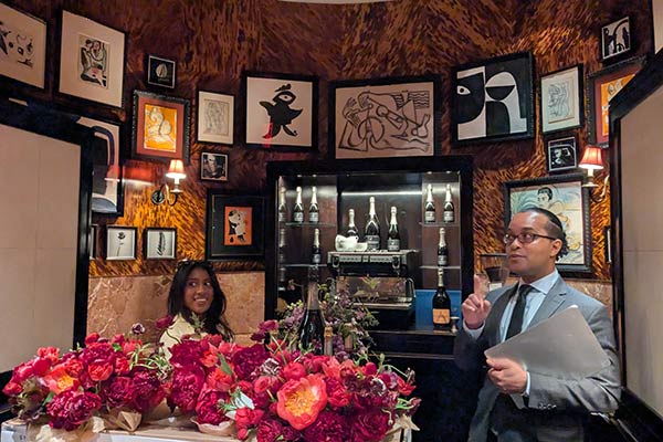 Image of front-of-house employees from the Carlyle Hotel giving a tour to CIA students in the Hospitality Club.