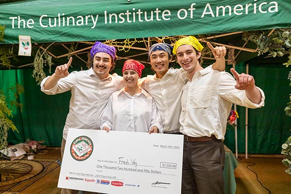 Image of the Hudson Valley Forest Floor team celebrating their victory in CIA’s Pizza Cook-Off competition.
