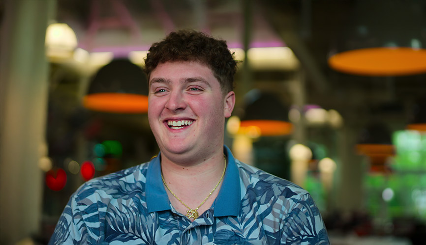 Image of Sidney Rubenstein ’22 smiling in The Egg at CIA in Hyde Park, NY.