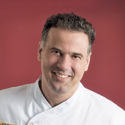 Headshot of CIA Culinary Arts alum Andy Nusser ’95.