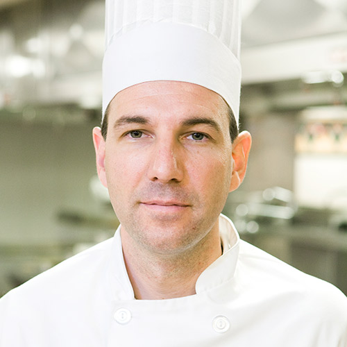 Headshot of CIA culinary arts certificate alum Bron Smith ’08.