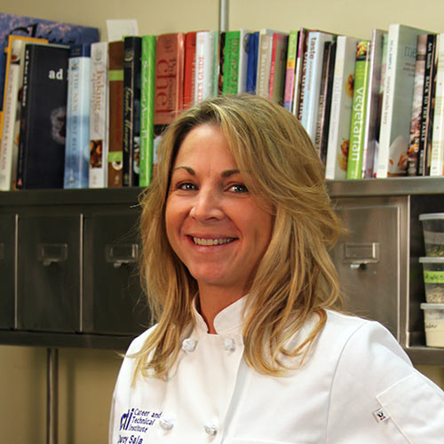 Headshot of CIA Culinary Arts alum Darcy Sala ’01.