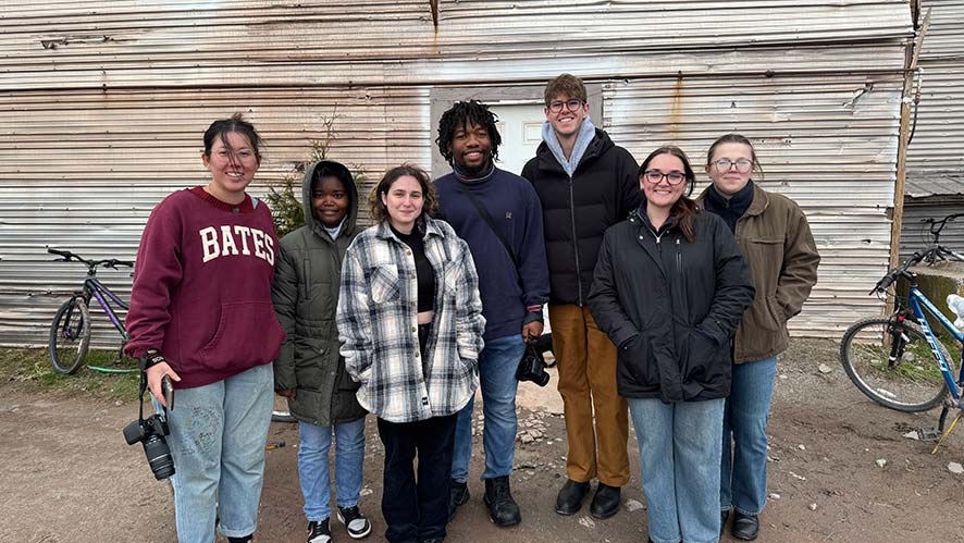 Seven CIA students stand outdoors at Hudson Valley Farms.