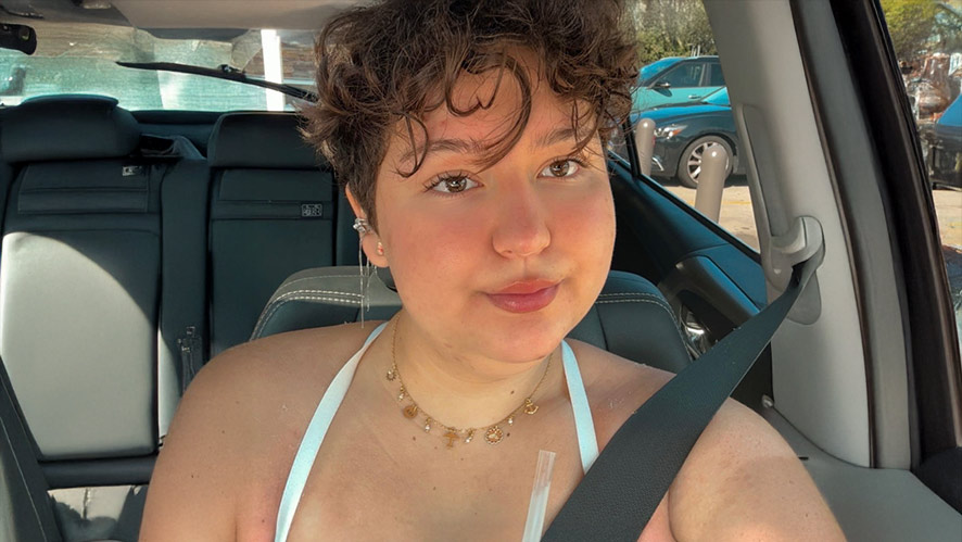 CIA student Mariana Suarez sitting in a car.